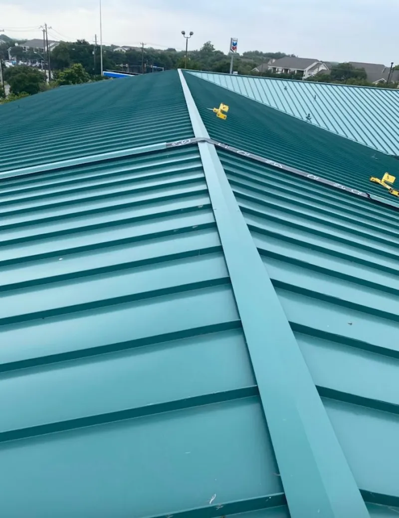 Green commercial metal roof ridge and valley for Metal Roof Repair in North Riverside