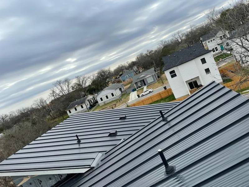 Standing seam metal roof panels with vents for Skylight Repair in North Riverside
